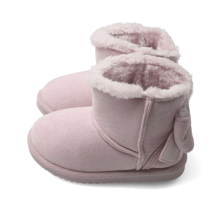 Shearling boots with ribbon