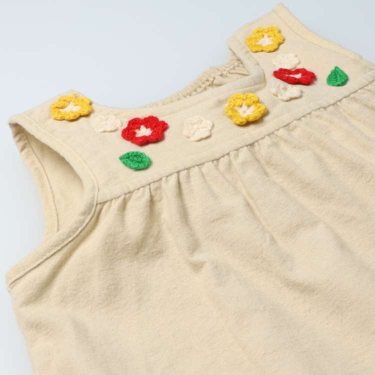 Jumper skirts and jumper skirts with flower motifs