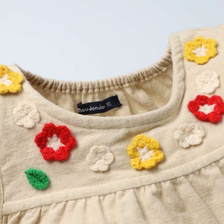 Jumper skirts and jumper skirts with flower motifs